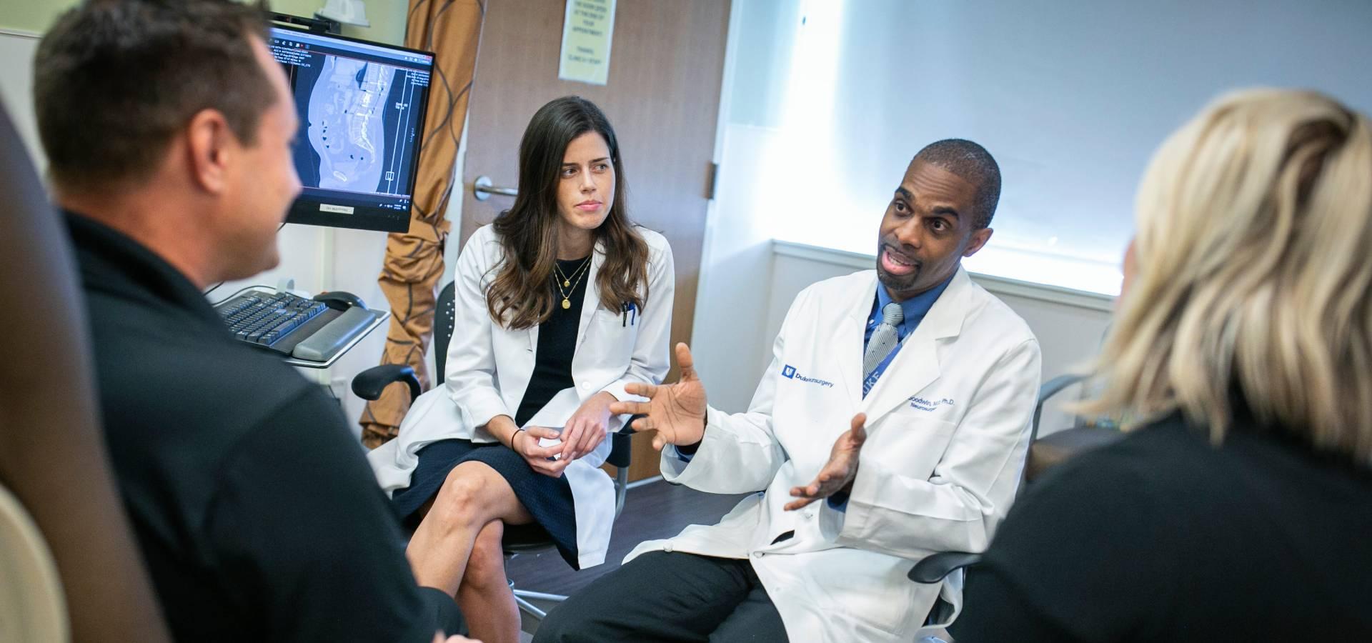 Dr. Goodwin explains x-ray to patients